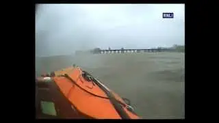 Blackpool lifeboat crew rescue man in water near pier