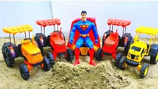 Hey Kids! Superman Finds Mini Tractor Wheels in the Sand 😲