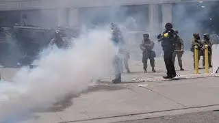 Anti-ICE protesters clash with police officers in chaotic confrontation in downtown LA