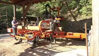 MILLING 4/4 WHITE OAK BOARDS FOR A CUSTOMER. LETTING AND FRIEND AND HELPER RUN THE MILL.