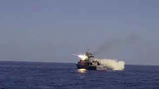 Iranian Navy fires on targets with cruise missiles & torpedo