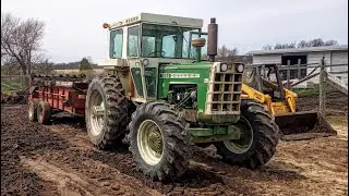 Oliver 1955 FWA returning used hay to the earth.