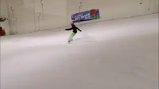 SNOcoat rider Keira (11) hitting park