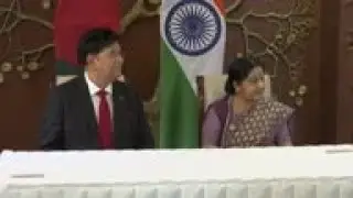 India and Bangladesh officials sign bilateral deals