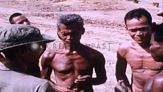 US 199th Light Infantry Brigade troops talk to local tribesmen at Fire Base Myron...HD Stock Footage