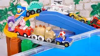 Cartoon Cars ☆ Mario, Disney and Thomas Mini Cars Roll Down A Gentle Ramp into Blue Water!