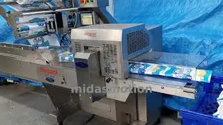 Used Redpack flowrapper packing multi-pack snack.