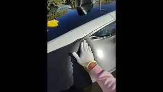 Wrapping a tesla satin black #automobile #wrap #shorts 