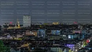 Aerial night timelapse panorama over Brussels skyline in Schaerbeek with Saint-Servais Church