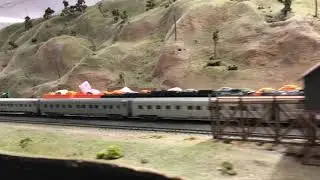 Santa Fe Superchief with Intermountain F7 DCC sound passing waiting UP Steam on siding N scale