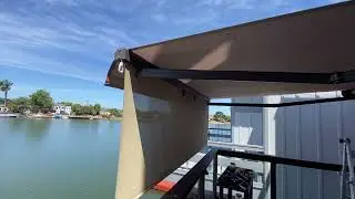 retractable awning top of the line with front drop down curtain