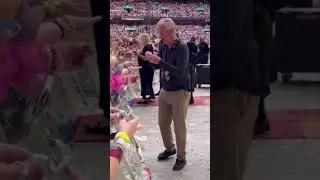 Taylor Swift's Dad Serves Up Chicken Tenders to Fans at Wembley Concert.