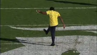 Michigan Player Temper Tantrum takes cleats to Michigan State logo during Pre-game Altercation