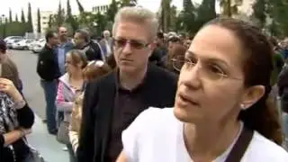 Bank of Cyprus workers protest outside central bank.