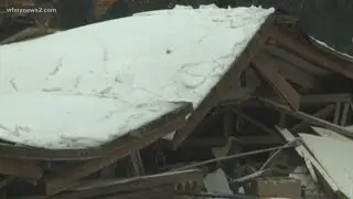 Heavy snow and sleet causing roof damage in the area