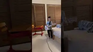 Elijah Simons with his Electric Guitar 082123