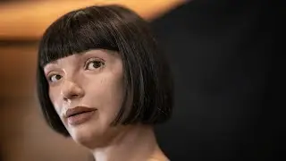 Portrait by humanoid artist makes art history at London auction
