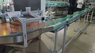 Automatic wick inserting machine for conical glass