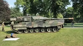 Leopard Tanks Loading on Trailers