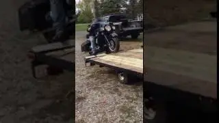 Loading a motorcycle on a trailer
