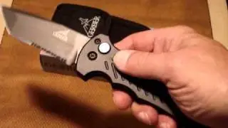 Gerber 06 Military Issue Black Tactical Automatic Knife ( Tanto/ Serrated )