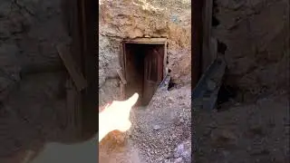 Exploring abandoned gold mining camp.