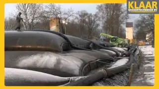 Klaar Baggertechnieken - Slib uit Donau ontwateren met GEOTUBE&reg;, Zuid Duitsland