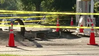 Lightning strike causes explosion at gas station, creating crater