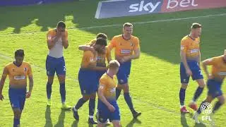 Tyler Walker scores the fourth goal at Exeter