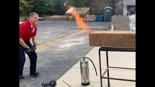 Fire Instructors burn a mini house! Protect your family by remembering to 