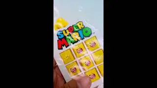 Super Mario toy with pink duck and yellow ducks