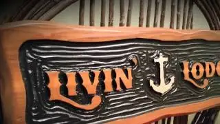 Custom carved cedar  signs by Adirondack Jim!