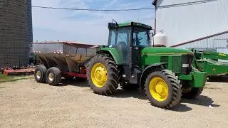 Spreading Fertilizer On Hay Ground