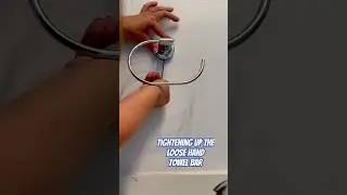 Tightening up the loose hand towel bar!