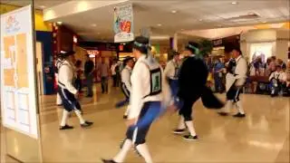 The Plymouth Morris Men Dance Trunkles Bledington at the Carrefour Hypermarket in Brest