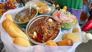 Food Travel: Eating Sacomi (a sandwich) in Togo.