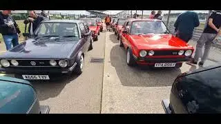 Mk1 Golf Owners Club at Silverstone Festival 2024. in the Paddock waiting to join the circuit.