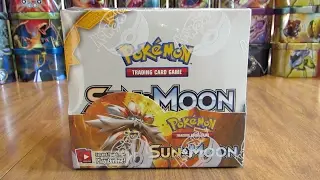 Открытие коробки с бустерами Pokemon TCG Sun & Moon, часть 1