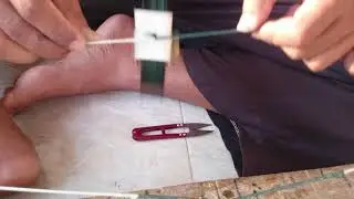 Cara tali saat buat string busur panah