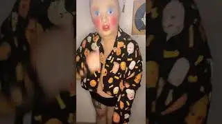 Almost naked dancing in a mask