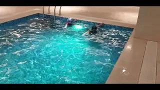 Students practicing breathing in front crawl swimming