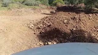 Cat 416 cargando 