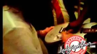 Steven Tyler Autographing A Guitar for Autograph Pros Charity Works Program