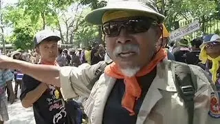 Thailand: interim PM flees meeting, at least 3 killed in Bangkok protests