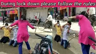 lady police Lathi charge in Assam
