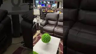 Leesworth Power Leather Reclining Sofa and Loveseat Set By Ashley