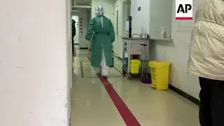 Beijing fever clinic sees multiple patients as COVID restrictions ease