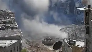 Syrian Army tanks engage ISIS in close combat as they attempt to advance in southern Damacsus