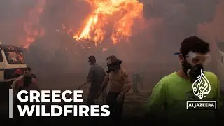 Firefighters in Greece struggle to contain wildfire near Athens