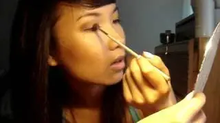 hanh's smokey golden brown eyes